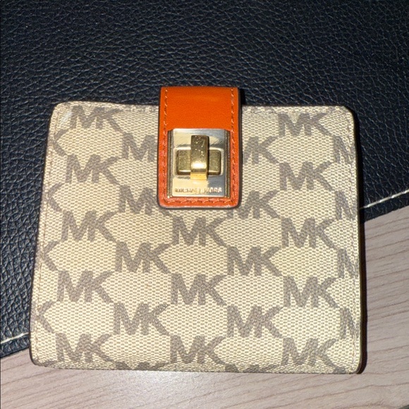 Michael Kors Handbags - Michael Kors Beige and Orange Monogram Natalie Medium Flap Bifold NWOT